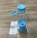 Blue Portable rechargeable USB blender on a wooden surface with a label indicating 'Blue 380ml'.