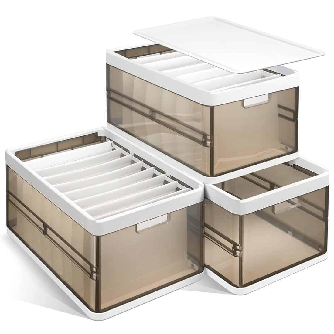 Set of three clear storage boxes with white lids on a white background
