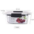Glass food storage container with cherry design and measurements on a white background