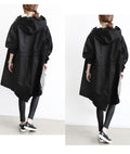 Person wearing a black hooded waterproof windbreaker from different angles on a white background