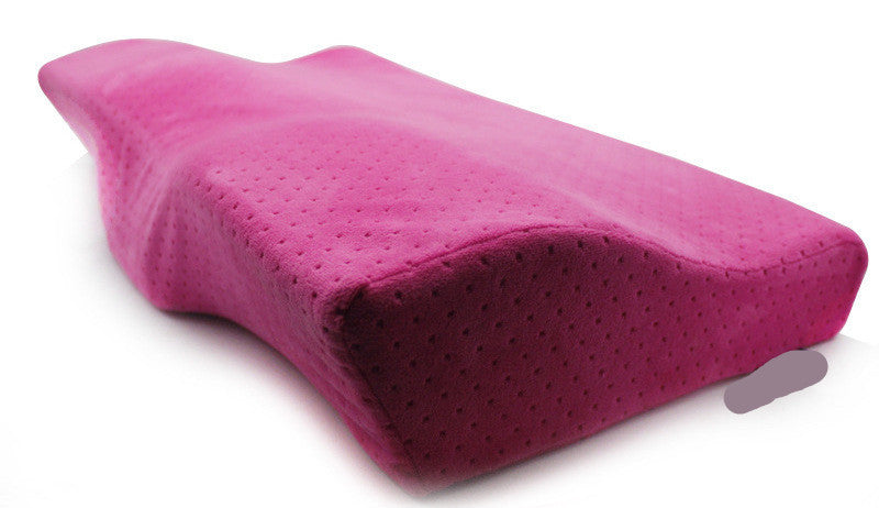 Pink memory foam pillow on a white background