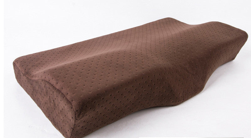 Brown ergonomic pillow on a white background