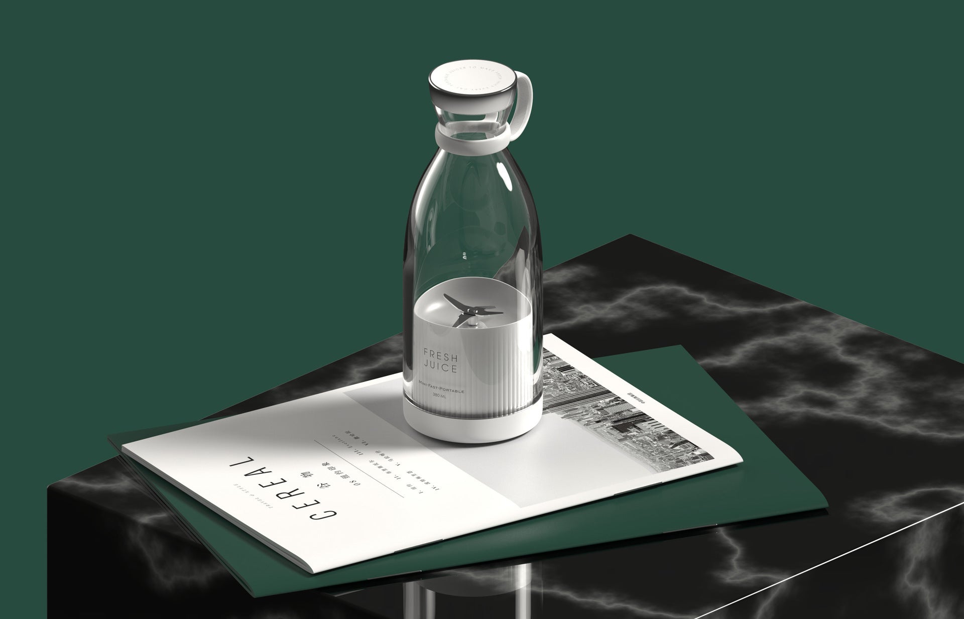 Clear Portable rechargeable USB blender with white base on a dark marble surface with a magazine underneath