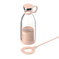 Clear Portable rechargeable USB blender with pink base and cap on a white background