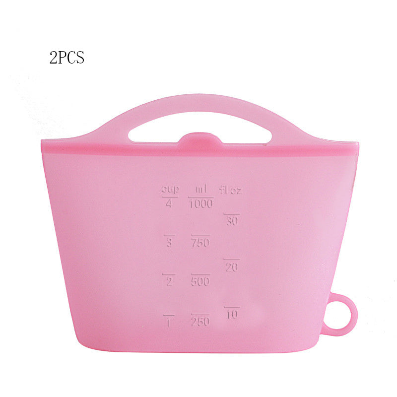 Pink silicone measuring cup with measurement markings on a white background; Simple food packaging silicone bag ideal for daily meal prep
