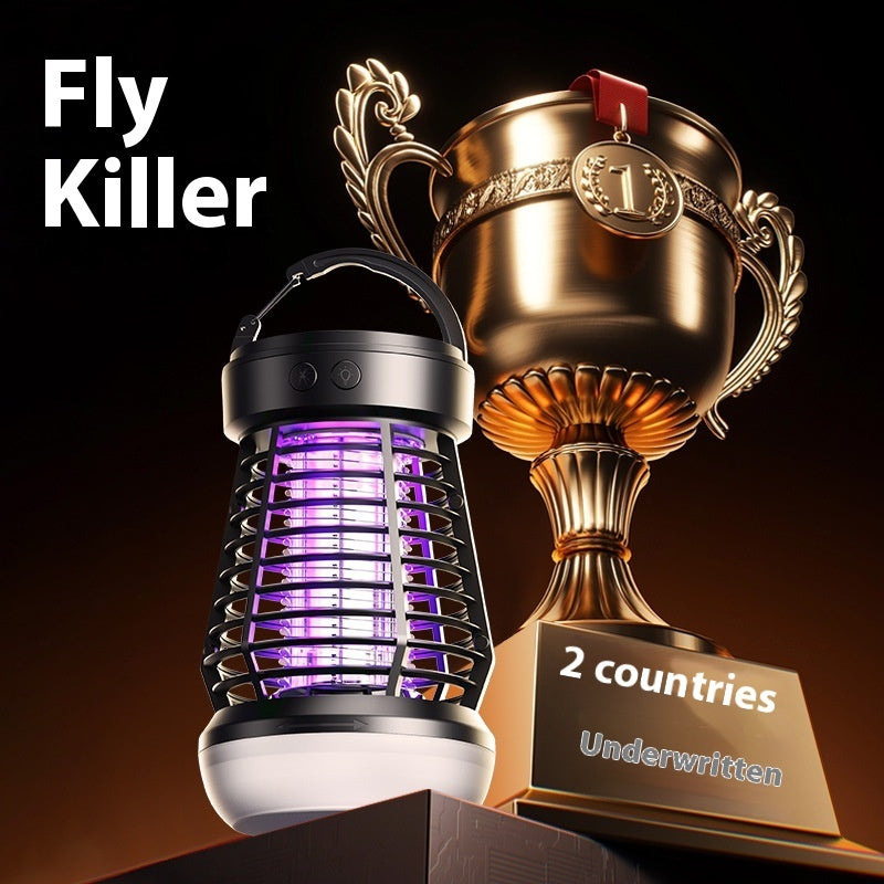 Fly killer device next to a trophy with '2 countries Underwritten' on a dark background