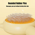 Pet grooming brush with rounded rubber pins on a beige background