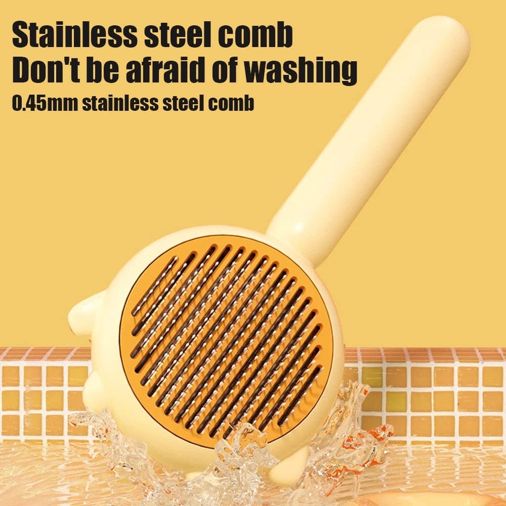 Stainless steel comb with water splashes on a yellow background