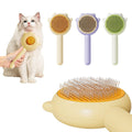 Cat grooming brush with a cat and multiple brush heads on a white background