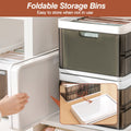Foldable storage bins with a hand opening one of them, set against a neutral background