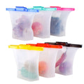 Set of silicone food storage bags with colorful lids on a white background; Reusable fridge and freezer safe food storage bags