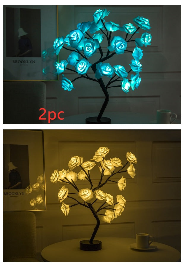 Two LED tree lights, one blue and one yellow, on a dark background.