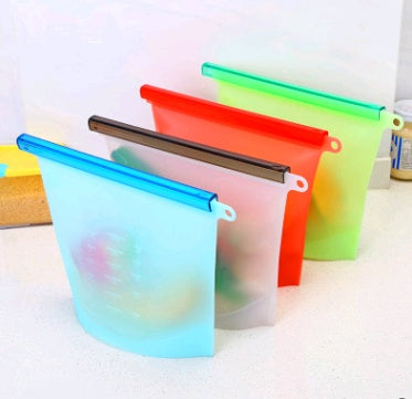 Set of colorful gradient bags with zippers on a white background; Silicone vacuum food storage bag leakproof