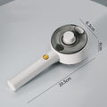 White handheld steam brush device with measurement details on a gray background