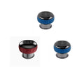 Three small round massager in black, blue, and red on a white background