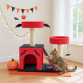 Large cat sitting on padded perch of Gothic cat tower