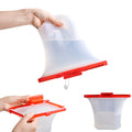 Hands holding a red and white silicone bag with a filter on a white background; Eco-friendly food-grade silicone storage bags sealed airtight