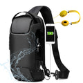 Black sling bag with smartphone charging feature and earbuds on a white background