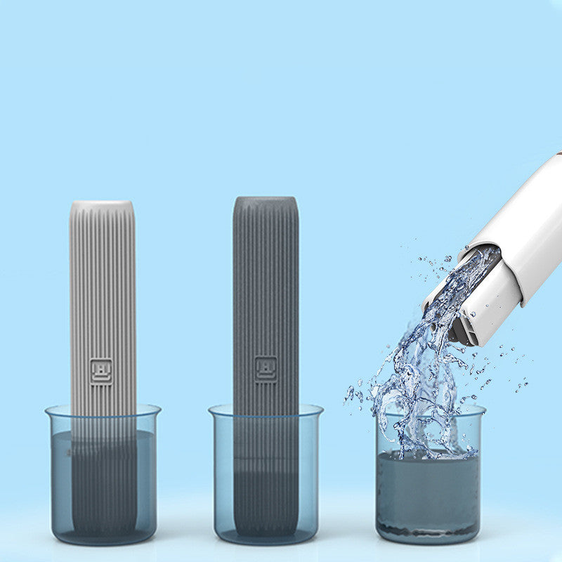 Water dispenser with water flowing into a glass on a blue background