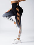 Black leggings with sheer side panels worn by a person on a white background
