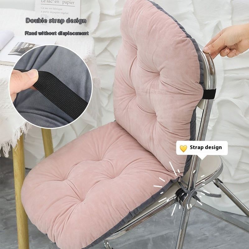 Chair with pink cushion on a white surface, with a book and tulips in the background; Ergonomic integrated office seat cushion with backrest in light gray viscose fabric