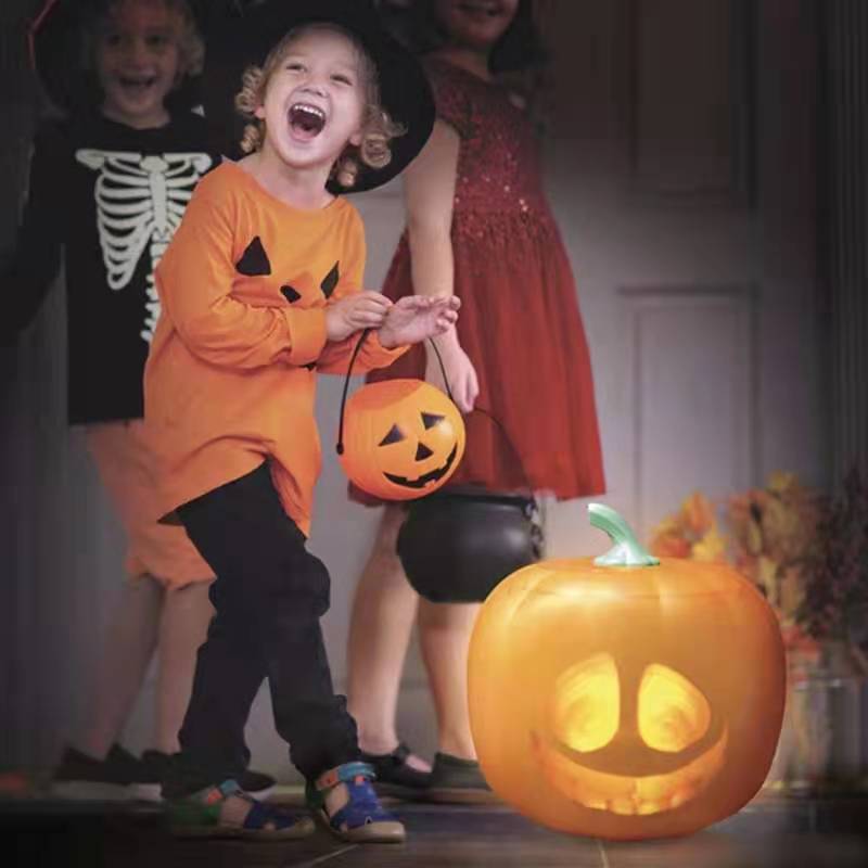 Talking pumpkin lantern projecting animated Halloween face indoors