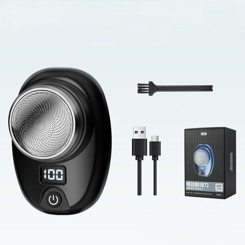 Grooming kit with electric shaver, brush, USB cable, and packaging on a light gray background