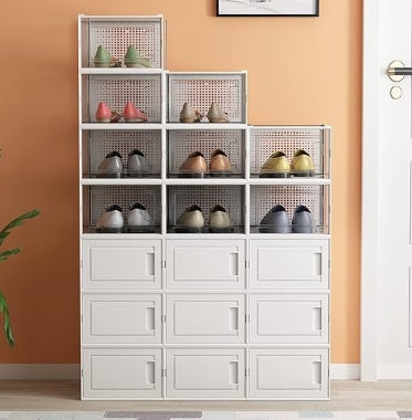 Transparent white shoe box stacked in a modern closet setup