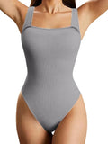 Gray ribbed swimsuit worn by a person on a white background