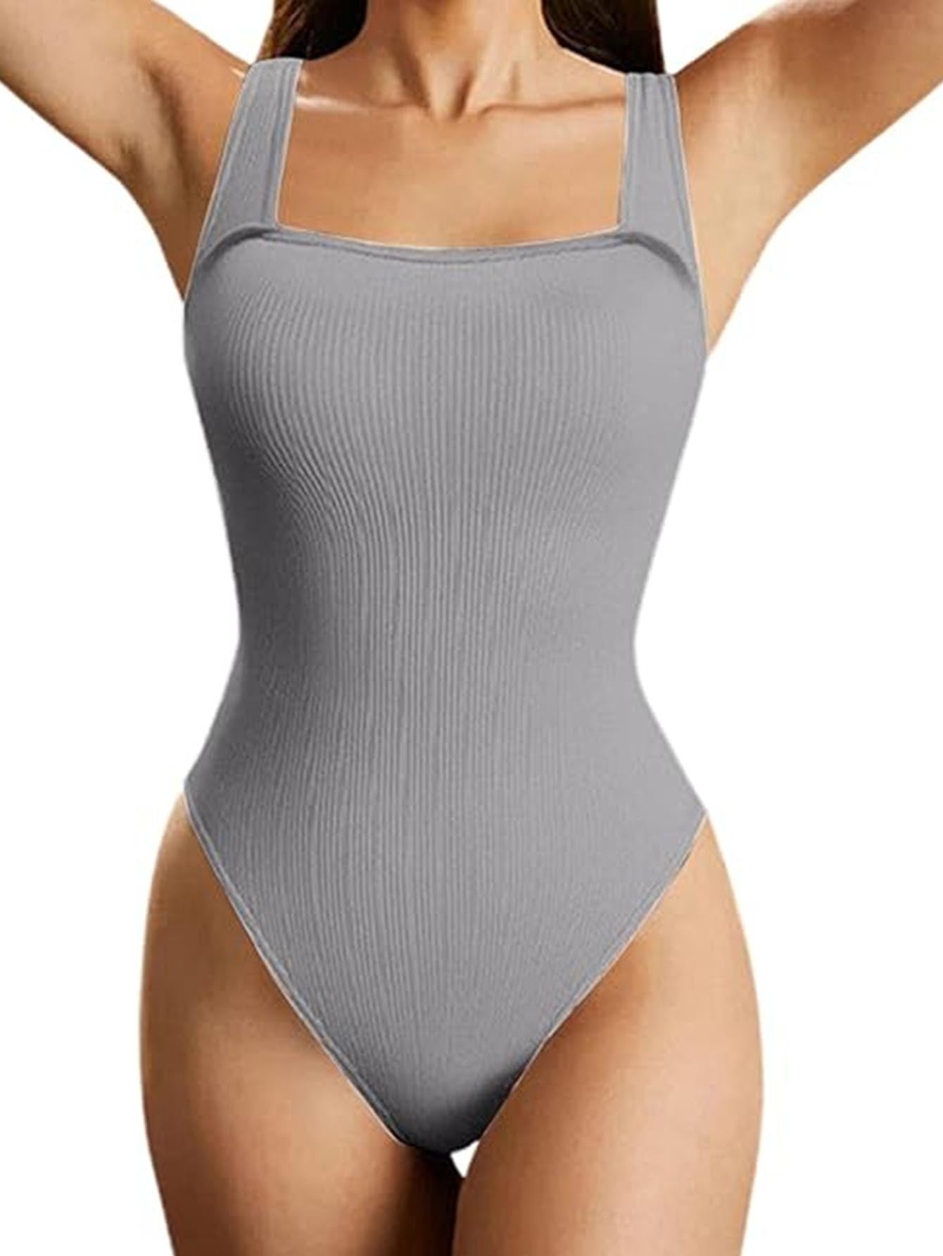 Gray ribbed swimsuit worn by a person on a white background