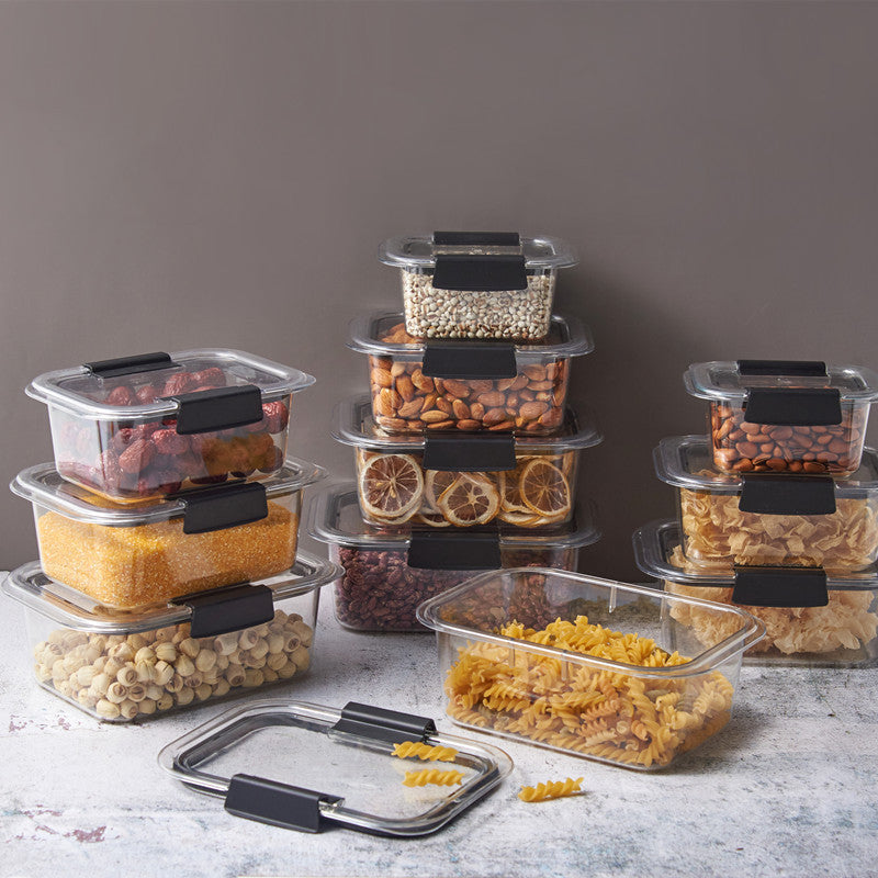 Square PET food container with airtight lid filled with mixed dried fruits