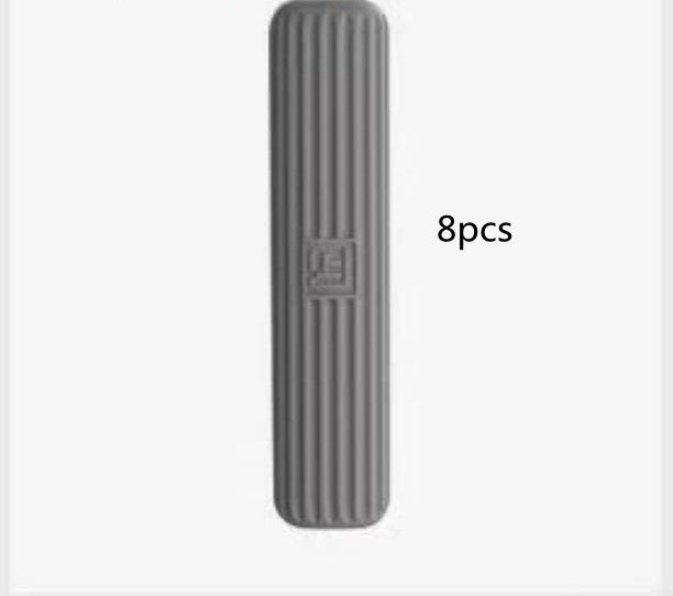 Gray rectangular mat with textured surface and '8pcs' text on a white background