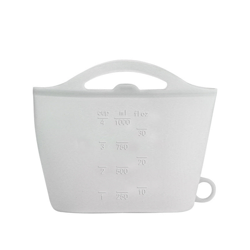Silicone measuring cup with handle on a white background