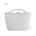 White silicone measuring cup with measurement markings on a white background