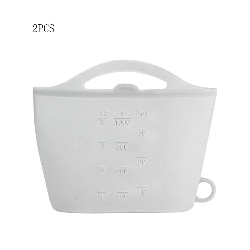 White silicone measuring cup with measurement markings on a white background