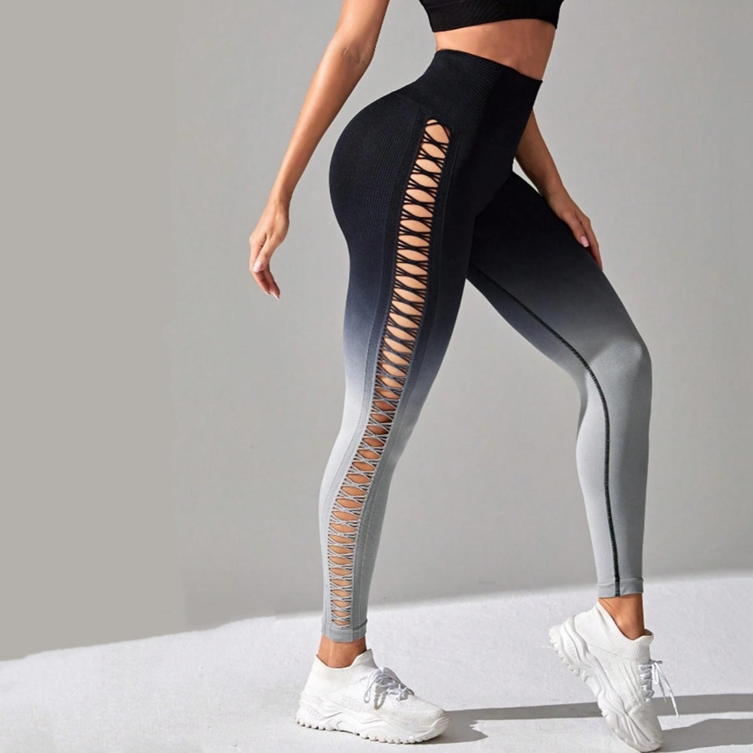 Woman wearing high-waisted gradient leggings in a yoga pose