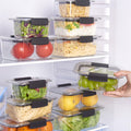 Refrigerator shelves with food containers and a hand reaching for one.