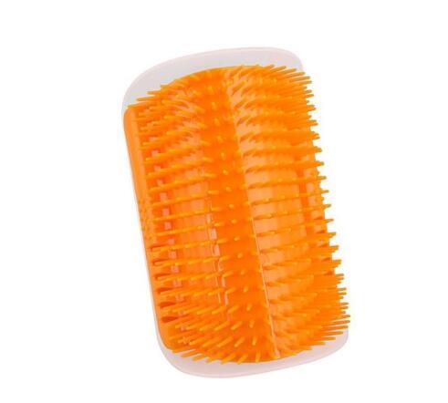 Orange cat grooming brush with a white handle on a white background