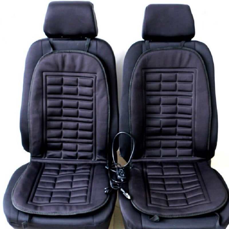 Pair of black car seat covers with grid pattern on a white background