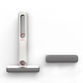 White handheld vacuum cleaner with gray attachment on a white background