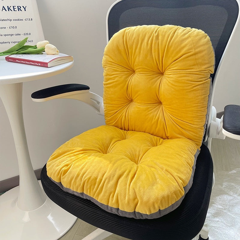 Yellow chair cushion on a chair with a table and books in the background; Ergonomic integrated office seat cushion with backrest in light gray viscose fabric