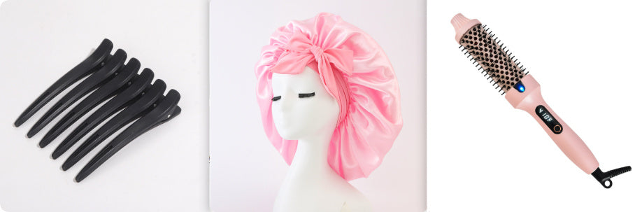 Set of hair accessories including black hair clips, a pink headscarf, and a pink hairbrush on a white background.