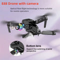 E88 drone with camera on a light purple background