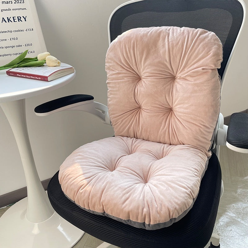 Chair with pink cushion on a white surface, with a book and tulips in the background; Ergonomic integrated office seat cushion with backrest in light gray viscose fabric