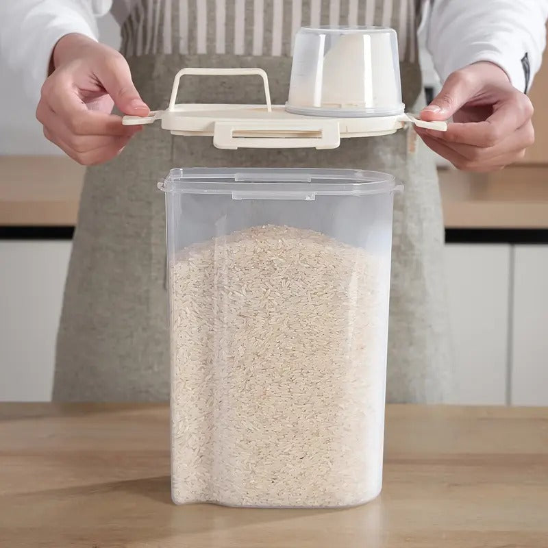 Rectangular sealed food container filled with rice, placed on a kitchen counter