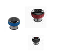 Three small round electronic devices in blue, red, and black on a white background
