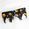 Cute dog with pumpkin and bone Halloween collar