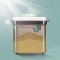 Storage box filled with baby formula powder next to measuring scoop