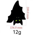Inverted bat on the wall décor for spooky setup