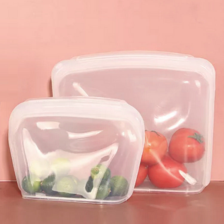 Set of reusable silicone food storage bags with vegetables on a pink background; Durable silicone bags in 1000ml to 3000ml sizes